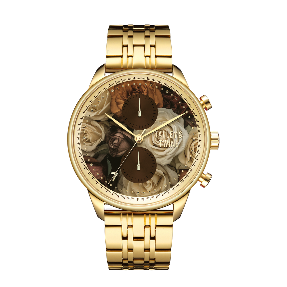 Mahogany Rose M watch features a gold-tone metal band and floral dial with roses and leaves, displaying intricate details.