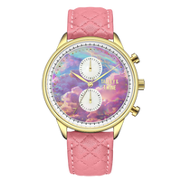Pink unicorn watch with a gold case, pastel cloud dial, and pink quilted leather strap.