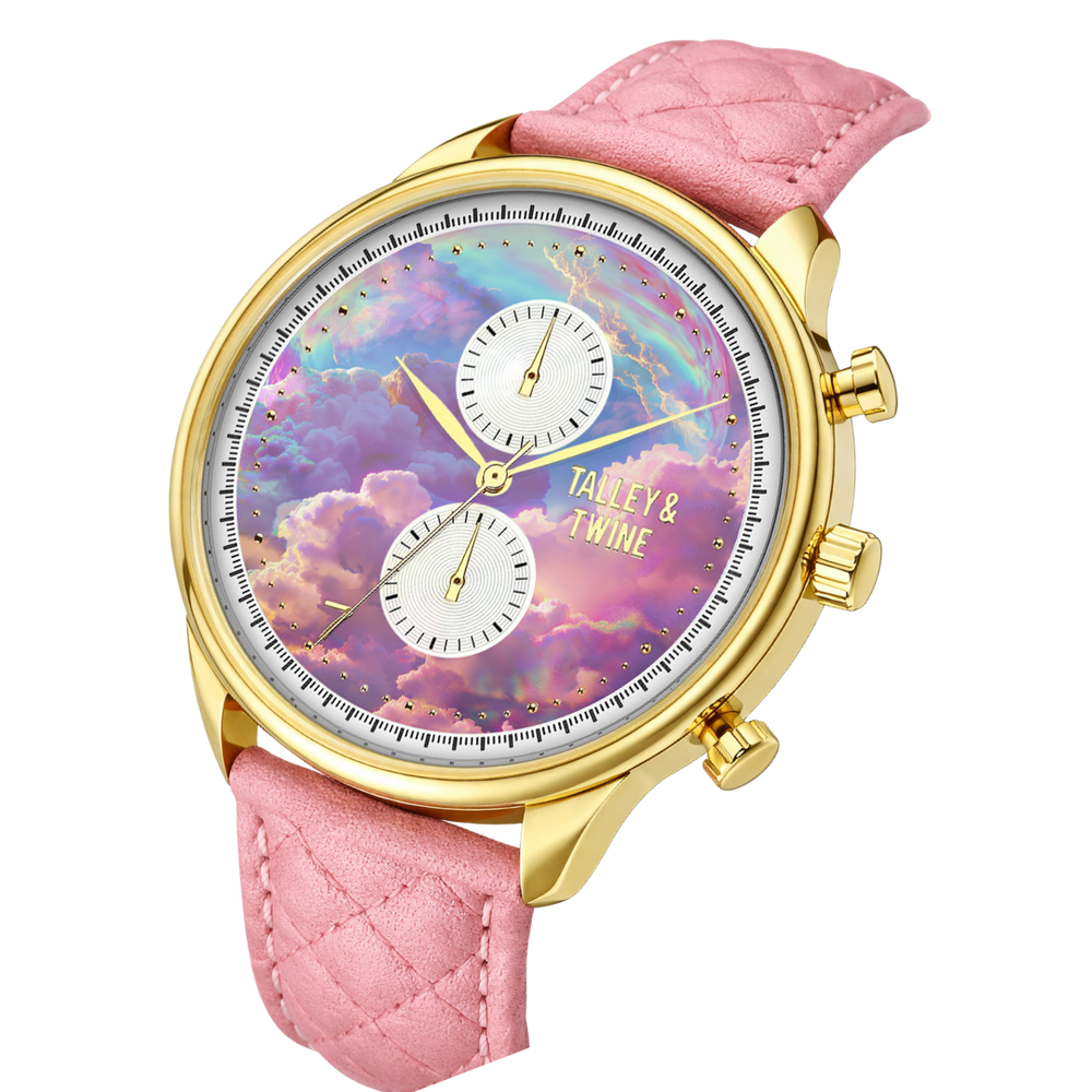 Pink unicorn watch with a gold case, white dials, and a pink quilted leather strap.