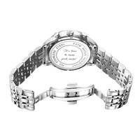 Grey Diamond M watch with a stainless steel band and a white dial, showing the back view and engraved text.