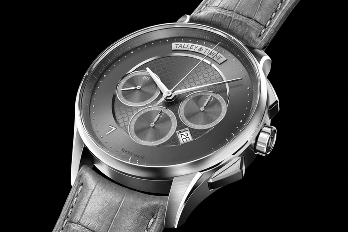 Talley & Twine Luxury watch with a dark face and leather strap on a black background