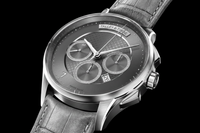 Talley & Twine Luxury watch with a dark face and leather strap on a black background
