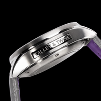 Close-up of a watch with 'Talley & Twine' branding on a black background