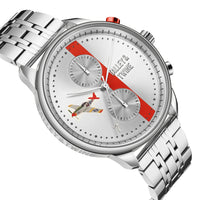Tuskegee Airmen Red Tails watch with silver dial, red accents, and airplane graphic on a stainless steel bracelet.